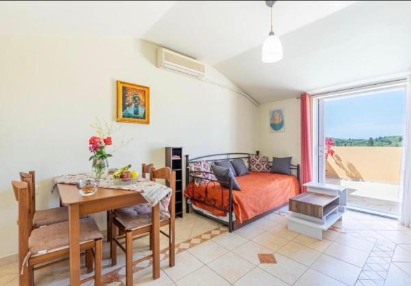 La Soffitta di Bampina, Boek Appartement Perivólion 