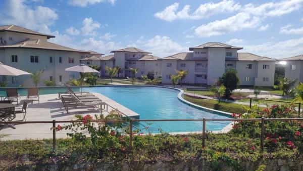 Apartamento no Village dos Ipês em Praia do Forte, Boek  Hotels in Bahia met parkeren, Parkeren