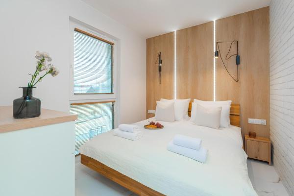 Flatbook Rodzinne Apartamenty Jantar Resort z Parkingiem, Placem Zabaw i Wiatą Grillową, Boek  Jantar 