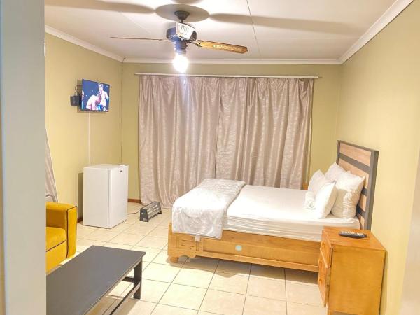 c and c guest house pretoria north, Boek  Pretoria 