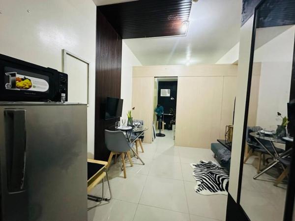 THEOS SUITE1 @TheGrassResidences, Boek  Luzon Hotels met een Zwembad, Zwembad