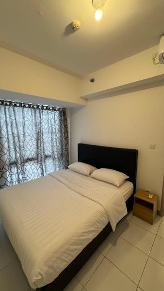 Cozy Minimalist Two-Bedroom Apartment by Jiu Zhai 九寨, Boek  Muara Banten