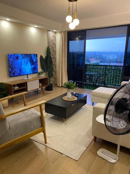 urban loft retreat apartment with fully equipped gym ,heated swimming pool, private parking and relaxing rooftop with breath taking views, Boek Appartement Nairobi Hotels met een Zwembad, Zwembad