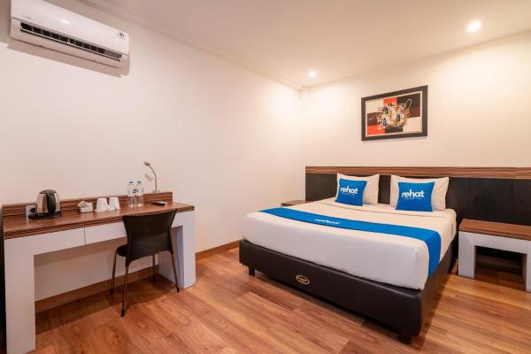 Rehat at Gania Hotel Bandung, Boek  Bandung Hotels met Parkeerplaats, in de buurt van Landmark Building, Parkeren